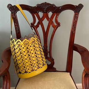Kate Spade “Dorie” desirable bucket bag in fabulous yellow